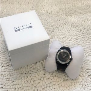 Gucci Sync watch.